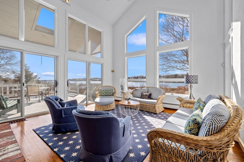 Discover the epitome of waterfront living at 58 Partridge Lane - Beach Home for sale in East Falmouth, Massachusetts on Beachhouse.com