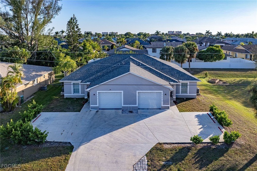 This exceptional, nearly new 2023-built duplex offers a rare - Beach Home for sale in Cape Coral, Florida on Beachhouse.com