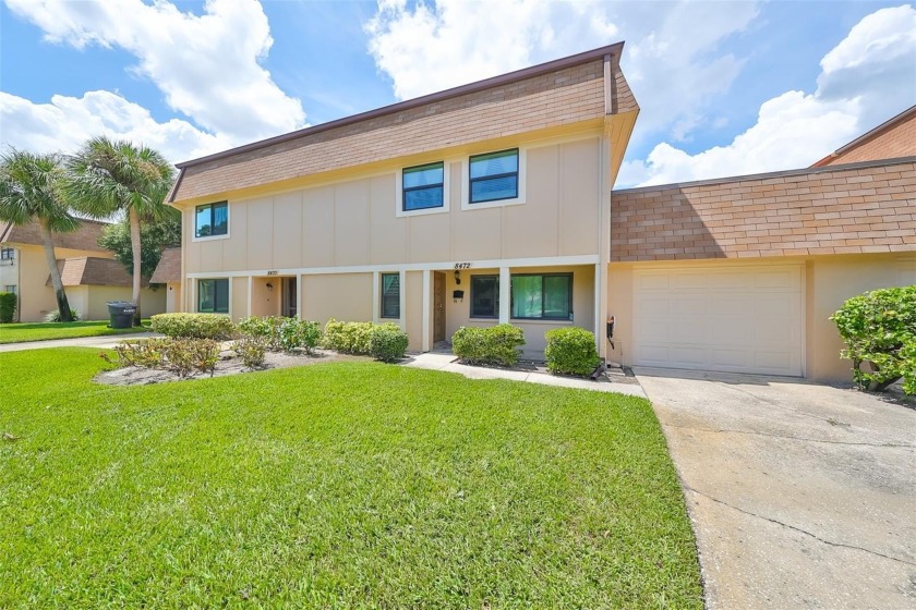 Welcome to your new home in the serene and sought-after Cinnamon - Beach Townhome/Townhouse for sale in St. Petersburg, Florida on Beachhouse.com