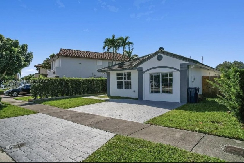 Beautifully remodeled lake front 3/2 with enclosed garage than - Beach Home for sale in Miami, Florida on Beachhouse.com