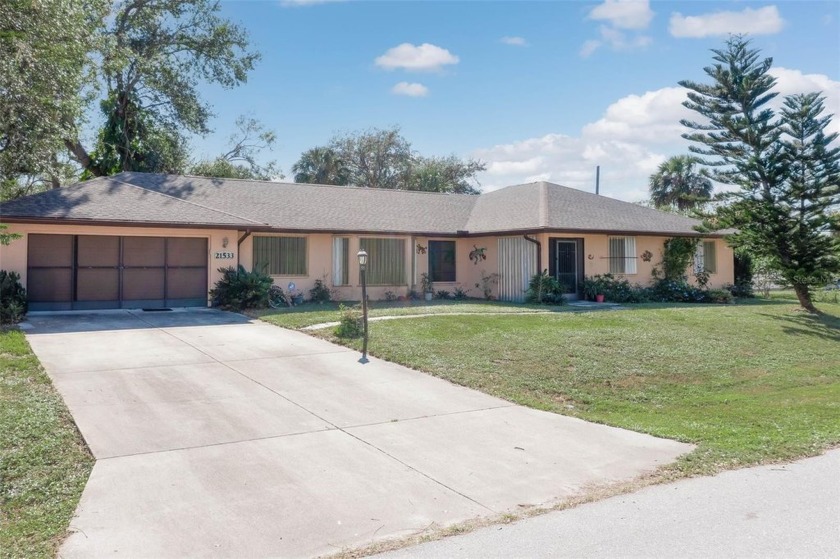 This lovely 4 bed/in-law suite, 2.5-bath residence offers - Beach Home for sale in Port Charlotte, Florida on Beachhouse.com