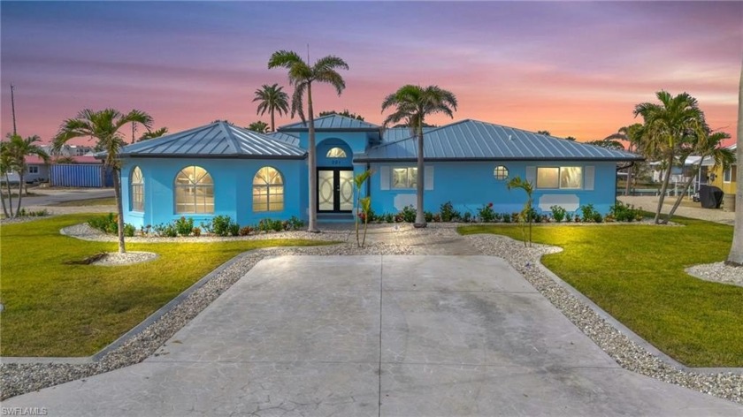 Freshly remodeled, this 4-bedroom, 3-bathroom pool home sits on - Beach Home for sale in Fort Myers Beach, Florida on Beachhouse.com