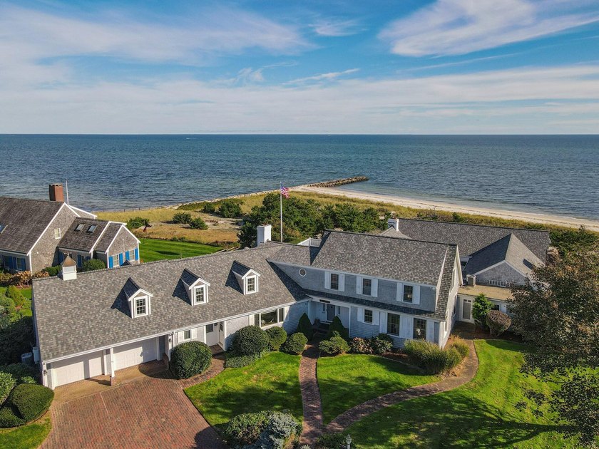 Sitting on a bluff overlooking the magnificent waters of - Beach Home for sale in West Harwich, Massachusetts on Beachhouse.com