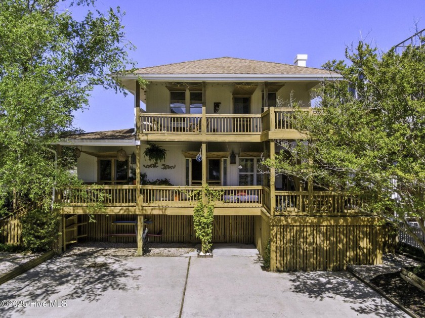 Nestled in one of Wrightsville Beach's most coveted residential - Beach Home for sale in Wrightsville Beach, North Carolina on Beachhouse.com