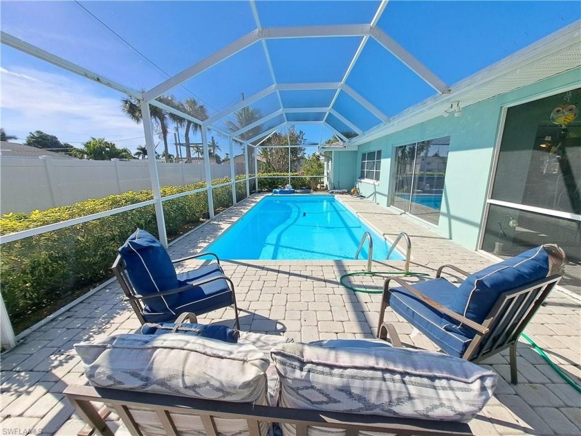 Welcome to this inviting home in Lochmoor Waterway Estates, a - Beach Home for sale in North Fort Myers, Florida on Beachhouse.com