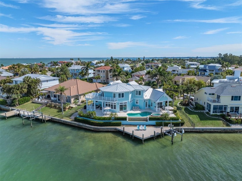Nestled at the northern-most point in the picturesque shores of - Beach Home for sale in Holmes Beach, Florida on Beachhouse.com