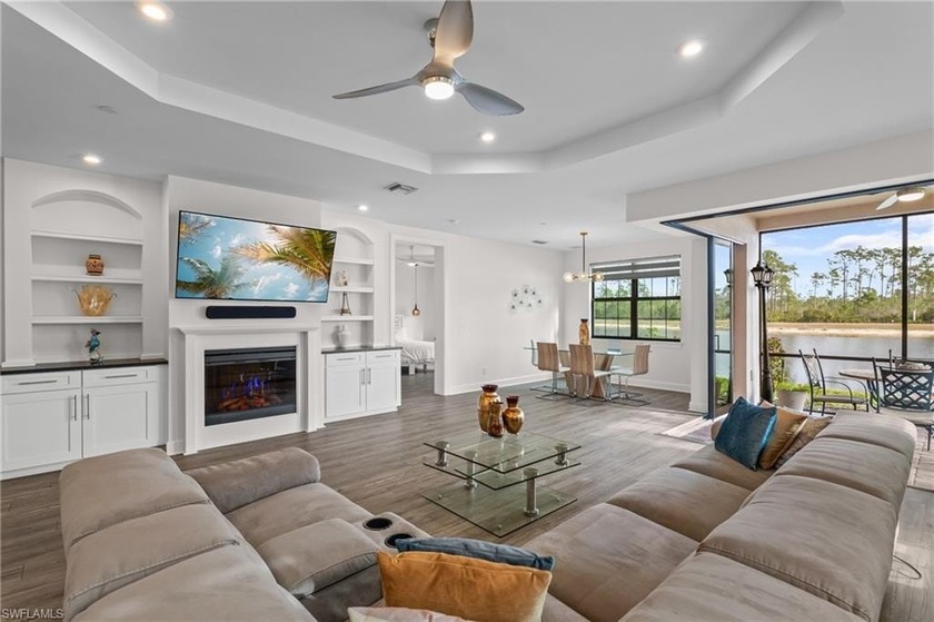STUNNING 2-BEDROOM + DEN COACH HOME WITH BREATHTAKING WATER & - Beach Condo for sale in Naples, Florida on Beachhouse.com