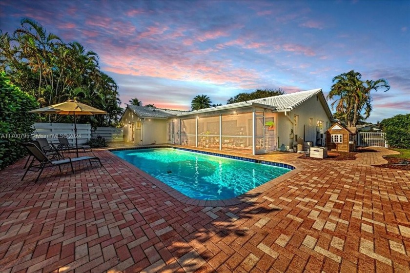 This stunning 4-bedroom, 2-bathroom home offers ultimate privacy - Beach Home for sale in Coral Springs, Florida on Beachhouse.com