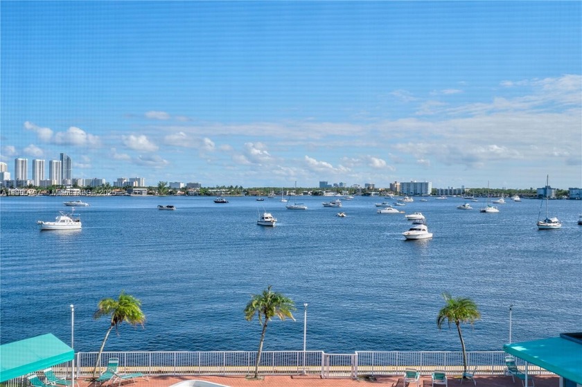 ENJOY SERENE WIDE-WATER VIEWS OF THE LAKE FROM THIS SPACIOUS 1 - Beach Condo for sale in Aventura, Florida on Beachhouse.com