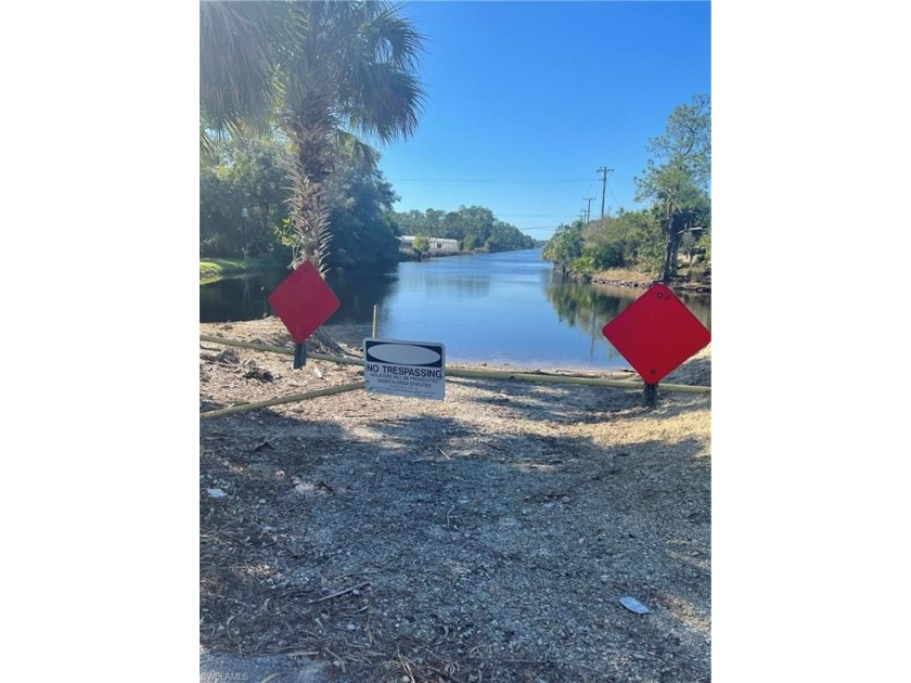 BEAUTIFUL TIP LOT ON CANAL W/330 CANAL FRONTAGE   RARE SQUARE - Beach Acreage for sale in Naples, Florida on Beachhouse.com