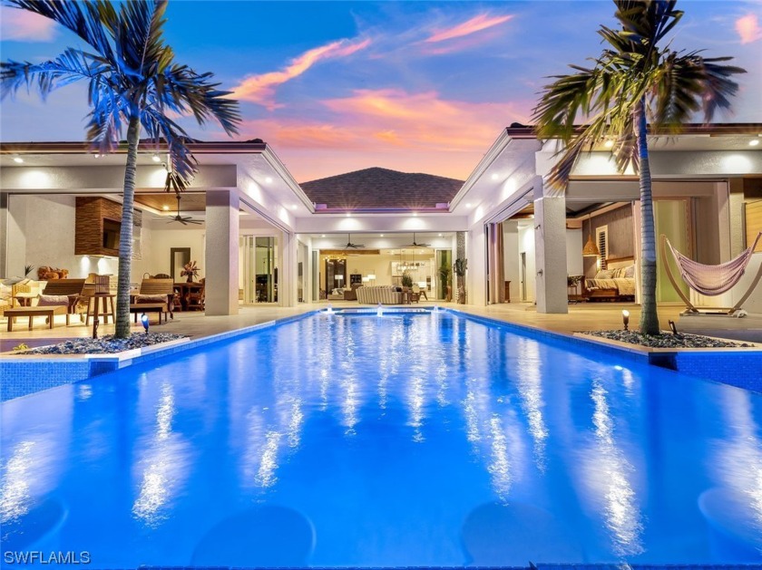 Embrace the epitome of Opulent Waterfront Living at this - Beach Home for sale in Cape Coral, Florida on Beachhouse.com