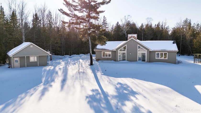 Imagine waking up to the peaceful sounds of Lake Michigan and - Beach Home for sale in Manistique, Michigan on Beachhouse.com