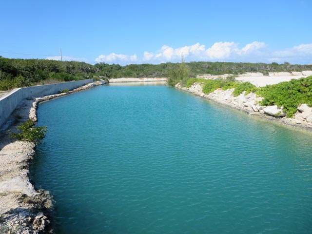 This 0.5 acre canal front lot is located within the Leeside - Beach Lot for sale in Providenciales, West Caicos on Beachhouse.com