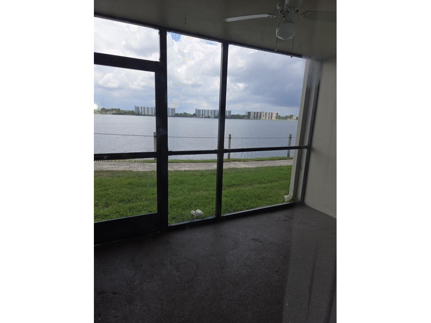 Experience the best of lakefront living in this bright and airy - Beach Condo for sale in Oakland Park, Florida on Beachhouse.com