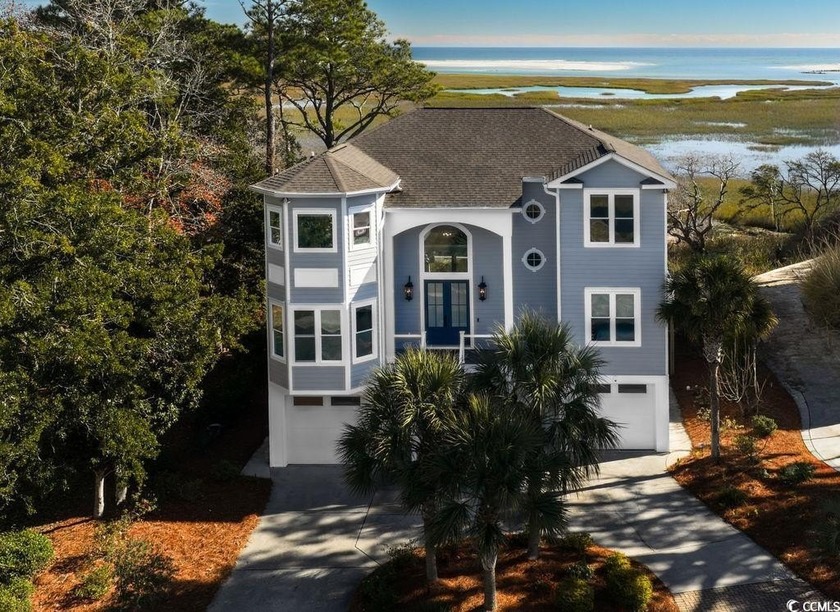 Beautifully updated, this gorgeous raised beach home in the - Beach Home for sale in Pawleys Island, South Carolina on Beachhouse.com
