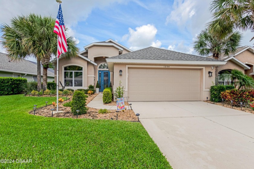 This exquisite 3-bedroom, 2-bath waterfront pool home in the - Beach Home for sale in Ormond Beach, Florida on Beachhouse.com