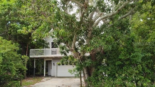 Welcome to this charming private stilt home with large detached - Beach Home for sale in Palmetto, Florida on Beachhouse.com