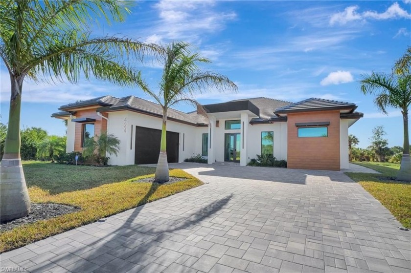 High End Custom Build Home with heated pool and spa. Situated on - Beach Home for sale in Naples, Florida on Beachhouse.com