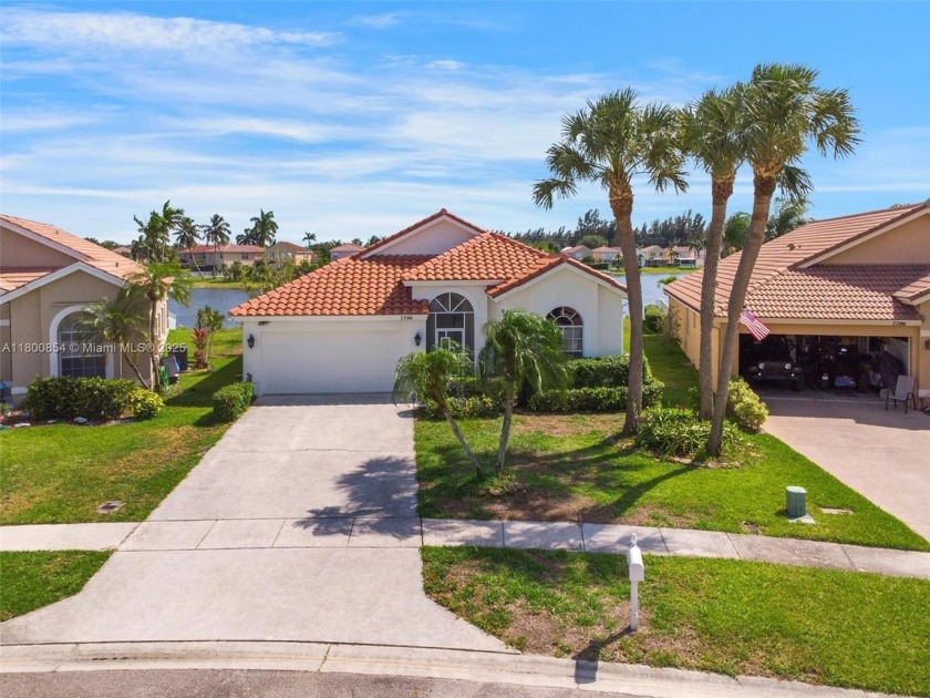 Breathtaking Lakefront Pool Home. Welcome to this beautifully - Beach Home for sale in Lake Worth, Florida on Beachhouse.com