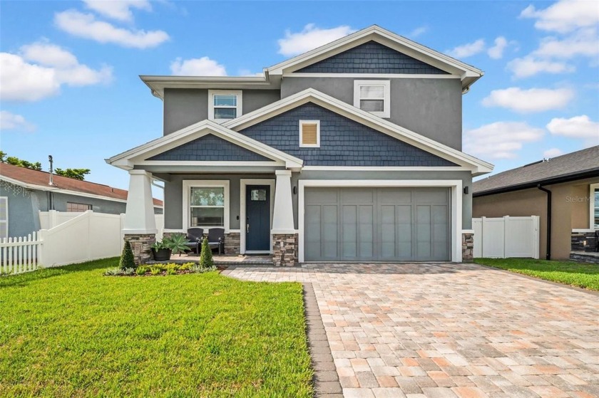 Discover this beautifully upgraded two-story home featuring 4 - Beach Home for sale in Tampa, Florida on Beachhouse.com