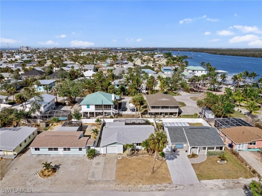 Your MID-ISLAND paradise awaits with this charming POOL HOME - Beach Home for sale in Fort Myers Beach, Florida on Beachhouse.com