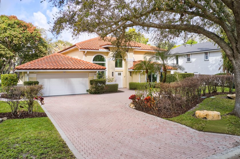 Stunning lakefront pool home in desirable GATED North Fork! - Beach Home for sale in Jupiter, Florida on Beachhouse.com