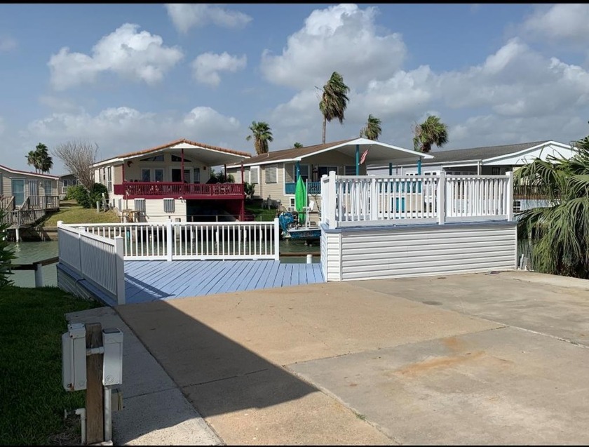 Amazing waterfront lot with large deck and seawall. Extra - Beach Lot for sale in Port Isabel, Texas on Beachhouse.com