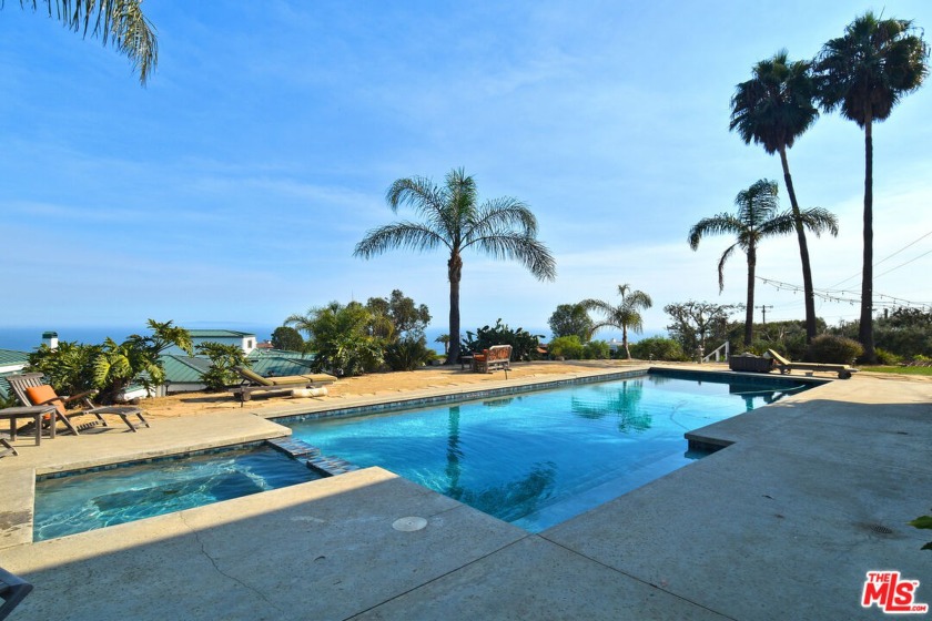 Situated on over 2.25 acres with panoramic ocean views lies this - Beach Home for sale in Malibu, California on Beachhouse.com