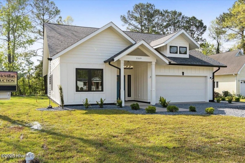 This adorable home is so full of sass... Spacious open floorplan - Beach Home for sale in Sunset Beach, North Carolina on Beachhouse.com