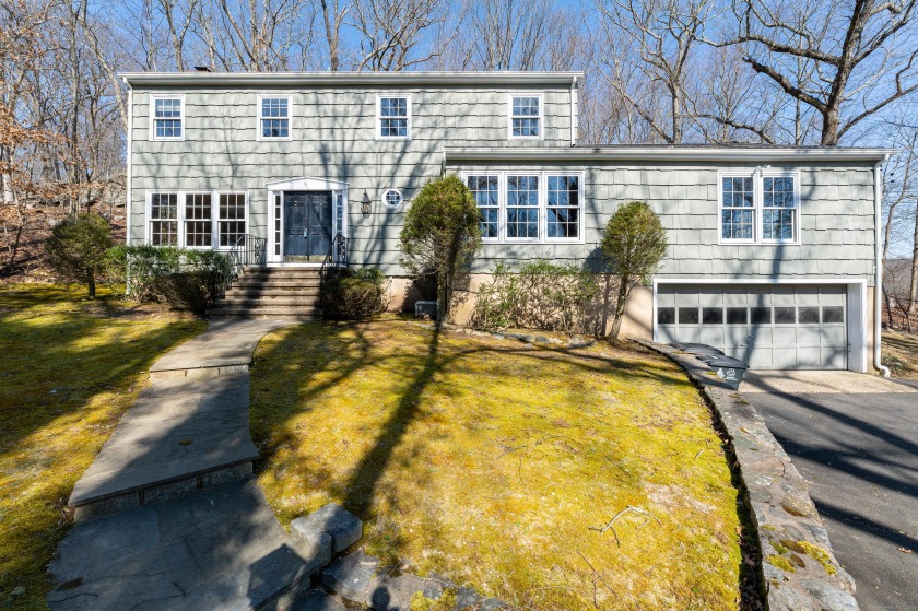 This quintessential center hall colonial is nestled at the end - Beach Home for sale in Stamford, Connecticut on Beachhouse.com