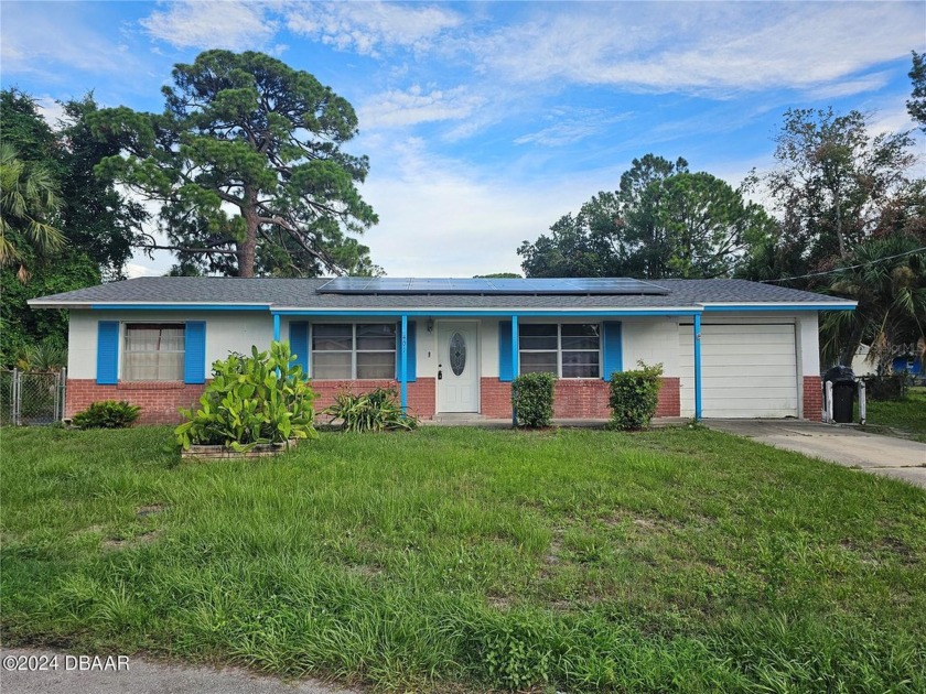 This charming home features 3 bedroom 1 1/2 bath and sits on - Beach Home for sale in South Daytona, Florida on Beachhouse.com