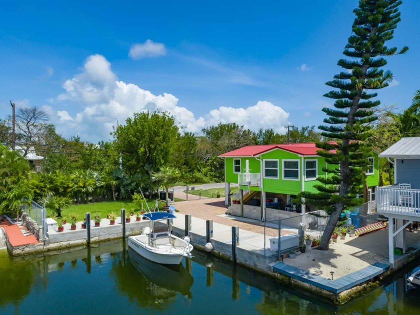 Stilted Eden Pines home nestled on a picturesque corner lot with - Beach Home for sale in Big Pine Key, Florida on Beachhouse.com