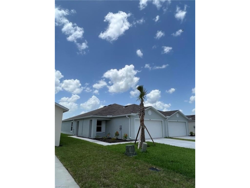 2022 year build 3 bed/2 bath Villa/half Duplex. In popular Gated - Beach Home for sale in Lehigh Acres, Florida on Beachhouse.com