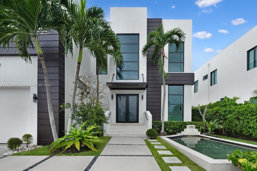 Introducing this stunning two-story waterfront home in the - Beach Home for sale in North Miami, Florida on Beachhouse.com