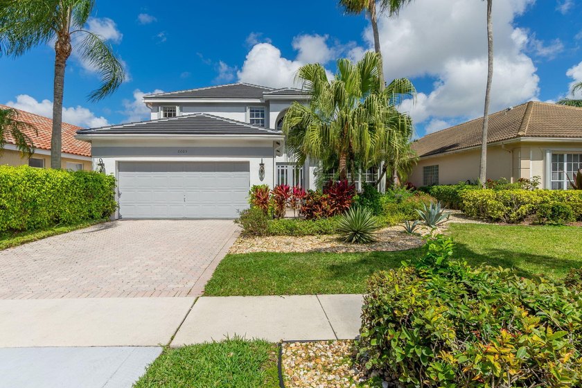 Stunning builder's model home located in the beautiful community - Beach Home for sale in Lake Worth, Florida on Beachhouse.com