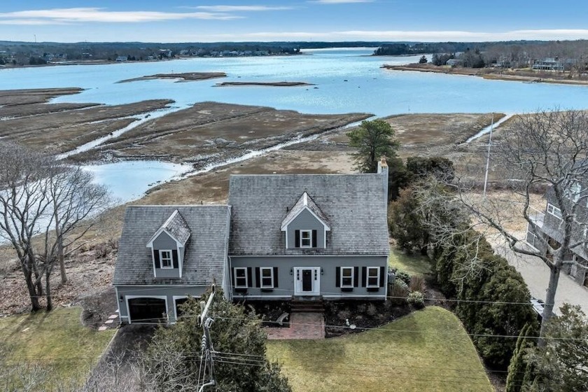 Escape to the tranquil shores of Pocasset Harbor with this - Beach Home for sale in Pocasset, Massachusetts on Beachhouse.com