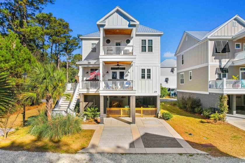 Welcome to this exquisite 3-bedroom, 2.5-bath raised beach home - Beach Home for sale in Pawleys Island, South Carolina on Beachhouse.com