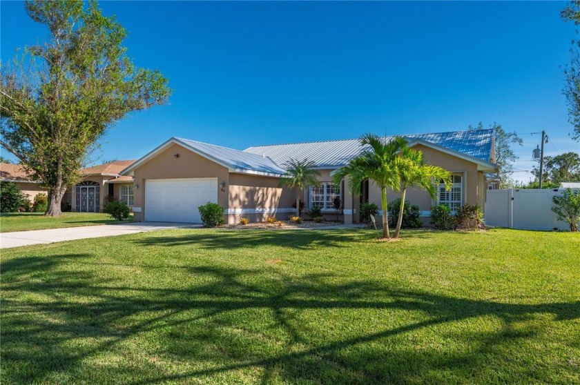 Welcome to your BEAUTIFULLY MAINTAINED 3-bedroom, 2-bathroom - Beach Home for sale in Port Charlotte, Florida on Beachhouse.com