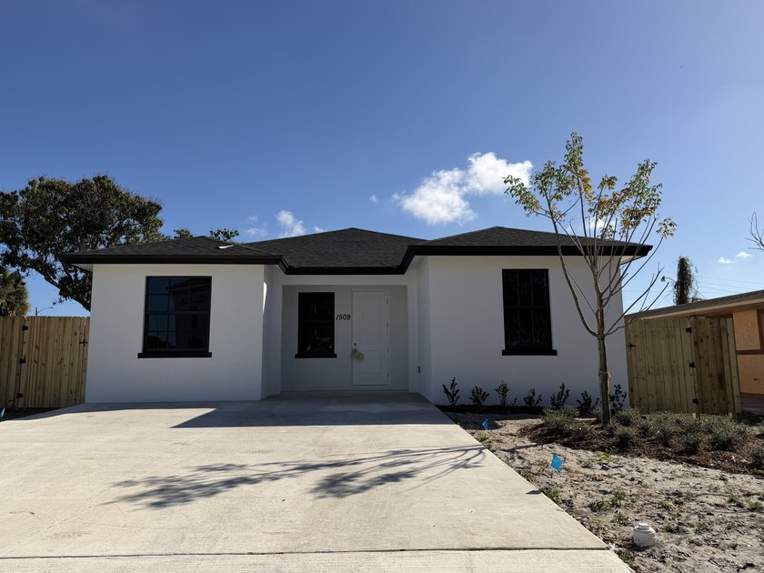 Welcome to your dream home! This brand-new, single-family gem - Beach Home for sale in Riviera Beach, Florida on Beachhouse.com