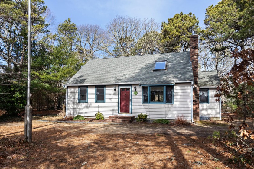 Nestled on a .56 acre wooded lot this 3 Bedroom, 2 Bath home is - Beach Home for sale in Eastham, Massachusetts on Beachhouse.com