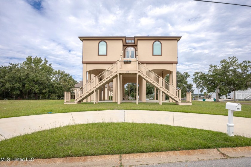 Experience the best of coastal living in this stunning 4 - Beach Home for sale in Ocean Springs, Mississippi on Beachhouse.com