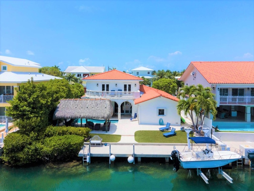 This Fantastic Venetian Shores pool home is ready for a new - Beach Home for sale in Plantation Key, Florida on Beachhouse.com