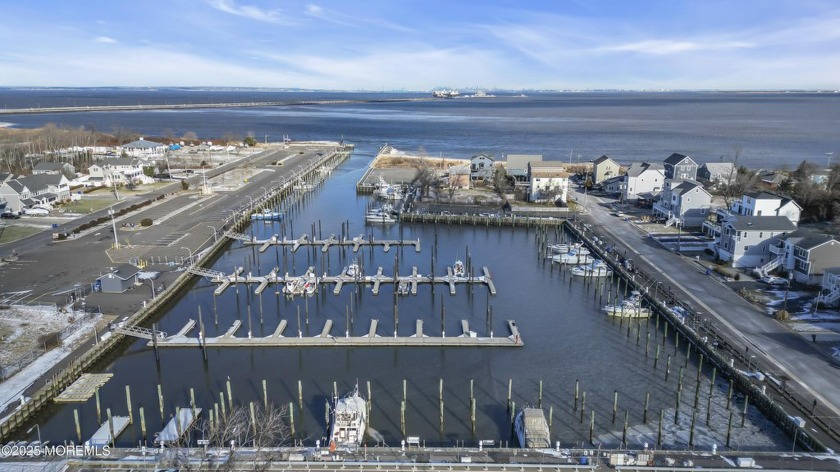 Nestled directly along the picturesque Leonardo Marina, this - Beach Home for sale in Leonardo, New Jersey on Beachhouse.com