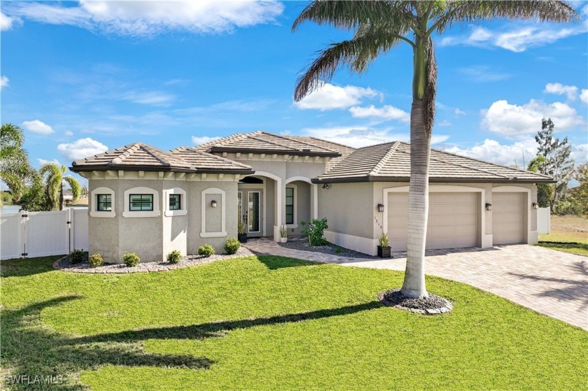 LAKEFRONT LUXURY!  This stunning residence, built by the - Beach Home for sale in Cape Coral, Florida on Beachhouse.com