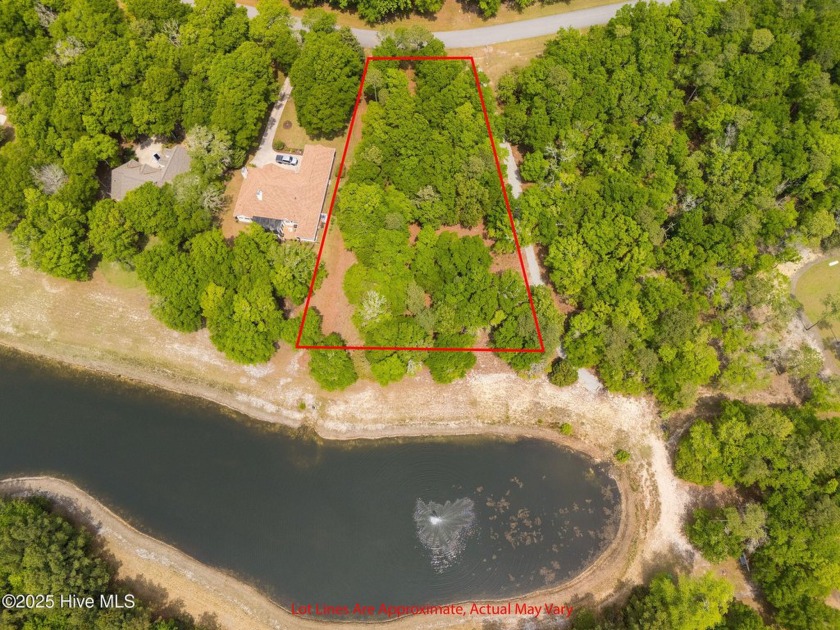 Build your dream home on this spacious 0.95-acre pond-front lot - Beach Lot for sale in Supply, North Carolina on Beachhouse.com
