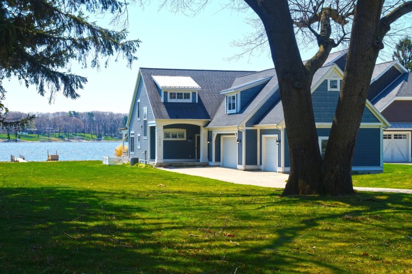 This must-see lakefront home, set back from the road on a1-acre - Beach Home for sale in Muskegon, Michigan on Beachhouse.com