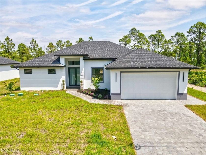 Stunning New Construction in Lehigh Acres! Discover modern - Beach Home for sale in Lehigh Acres, Florida on Beachhouse.com