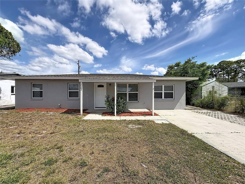 Nestled in the heart of Tampa, this 3 bedroom, 2 bath home that - Beach Home for sale in Tampa, Florida on Beachhouse.com