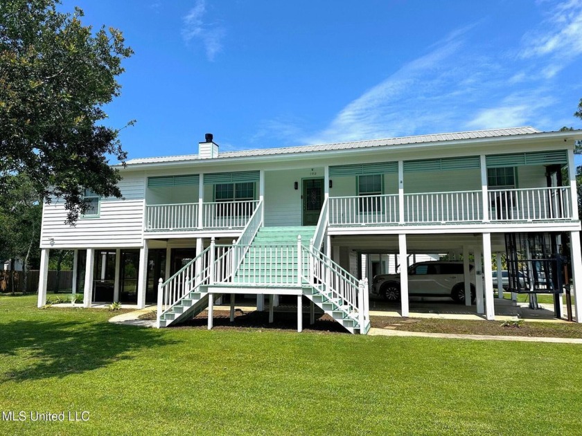 Welcome to this home nestled on a spacious corner lot in Timber - Beach Home for sale in Pass Christian, Mississippi on Beachhouse.com