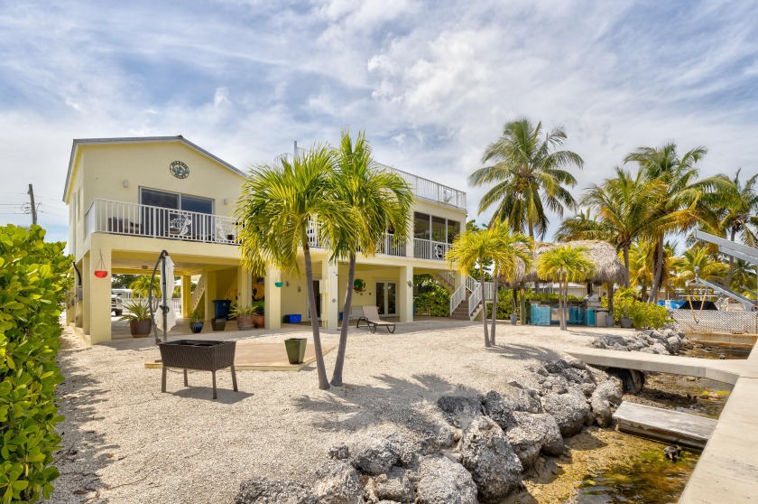 Exquisite 4/3 canal front home - situated in the heart of Key - Beach Home for sale in Key Largo, Florida on Beachhouse.com
